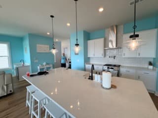 Kitchen with island seating inside our Perdido Key home