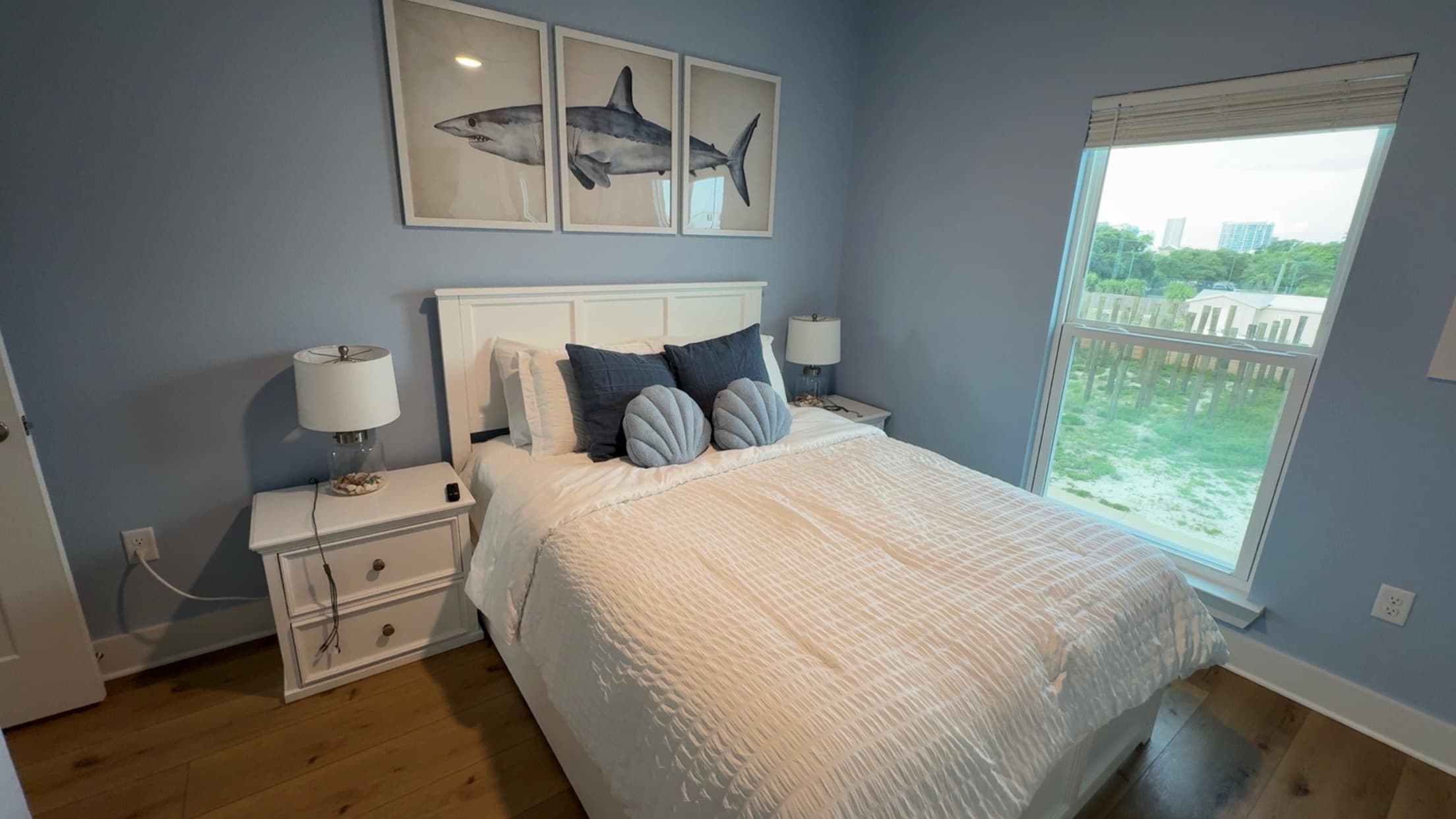 Blue queen bedroom inside our Perdido Key home