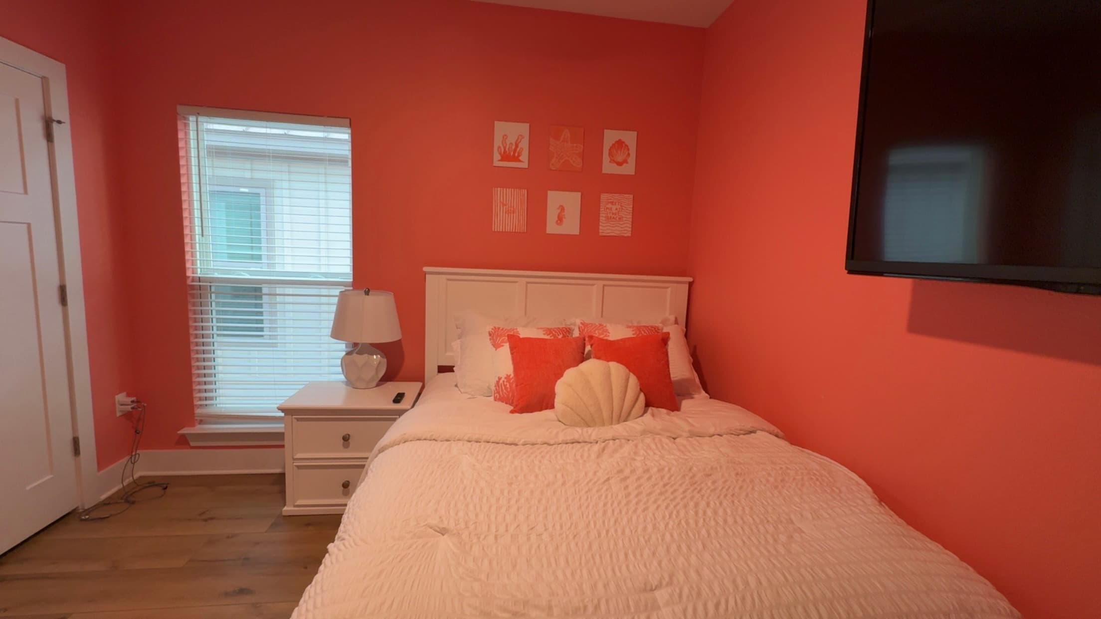 Coral queen bedroom inside our Perdido Key home