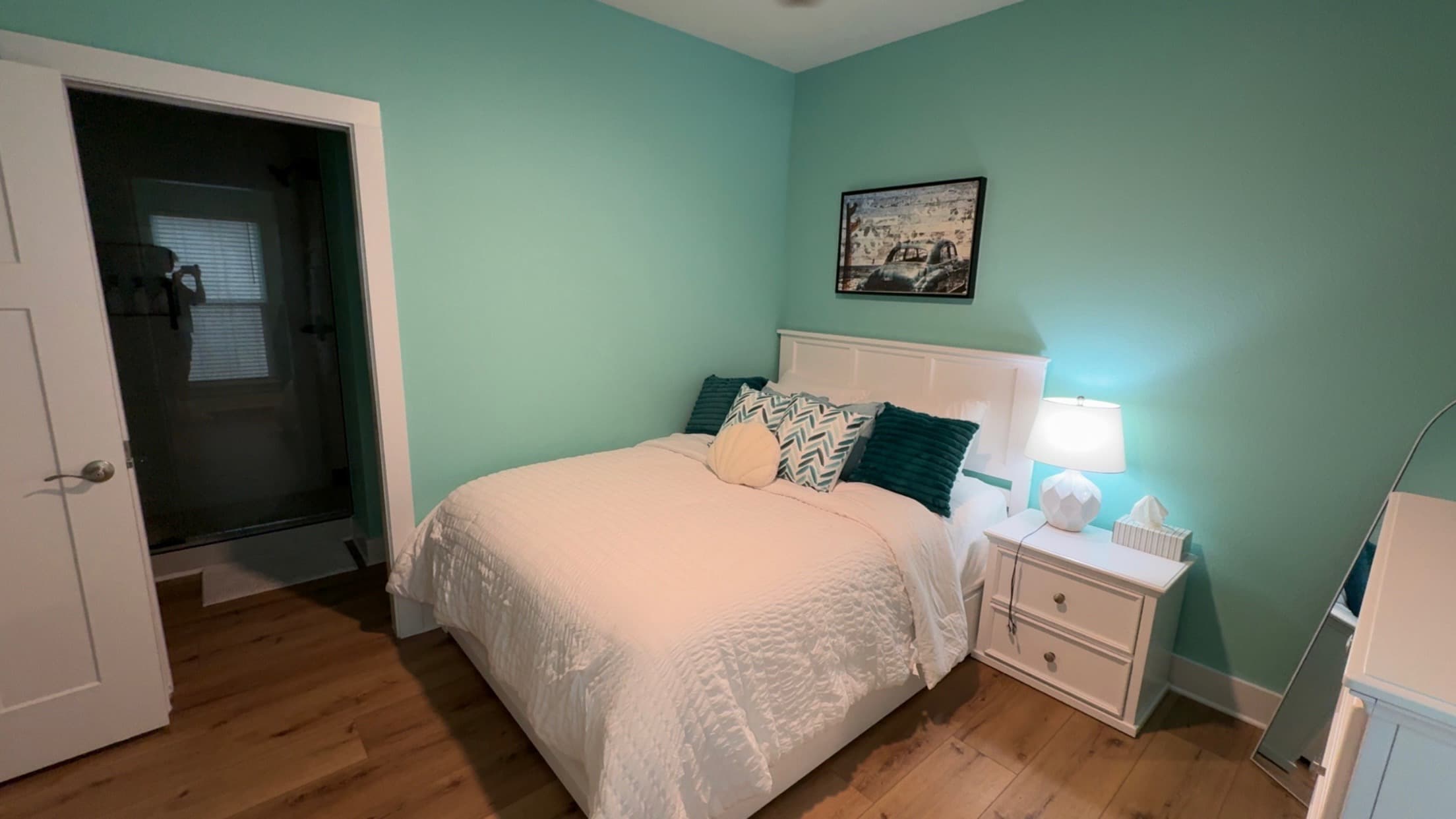 Green queen bedroom inside our Perdido Key home